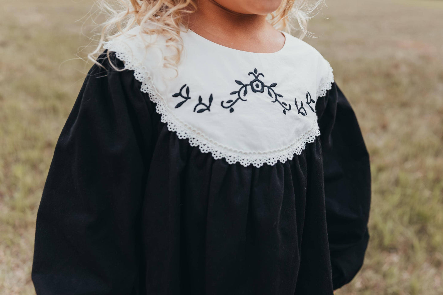 Black Embroidered Bib dress